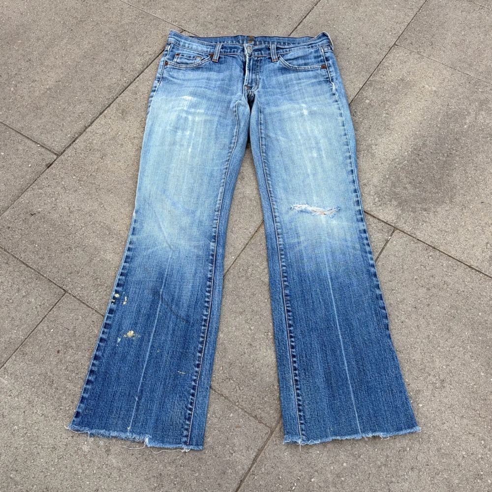 7 For All Mankind Flare Jeans Light Wash Distressed Raw Hem Low Rise Size 28